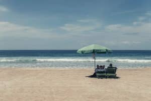 Beach with green umbrella